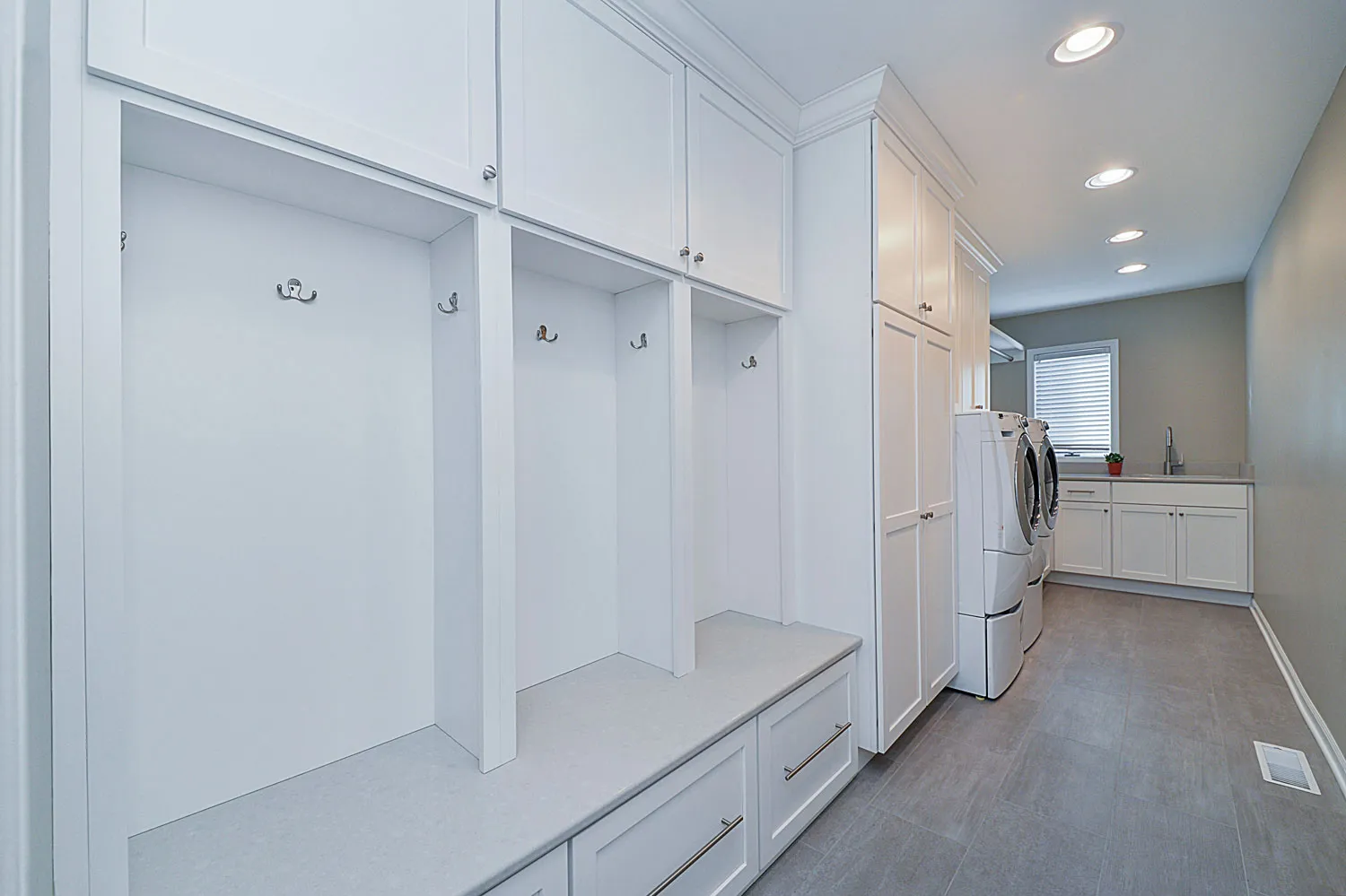 Sleek and Clean Mudroom and Laundry Room Remodel — photo 1