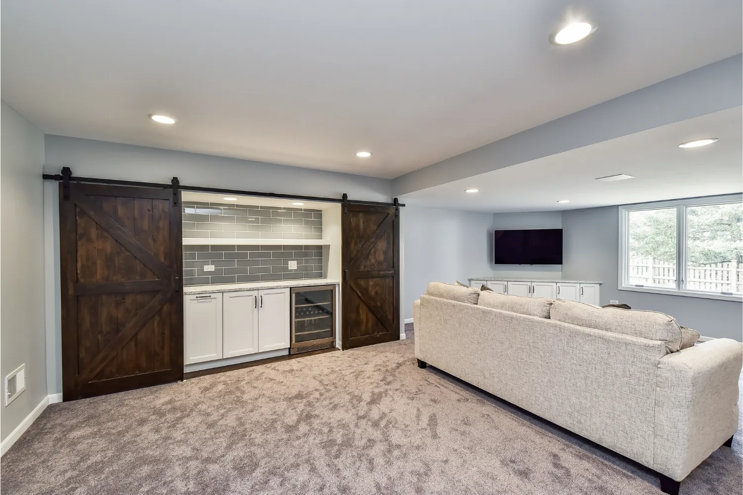 Creatively Crafted Basement Remodel — photo 1