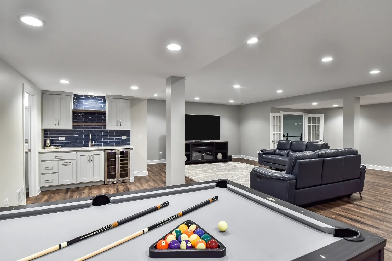 Sleek Amenities Basement Remodel — photo 1